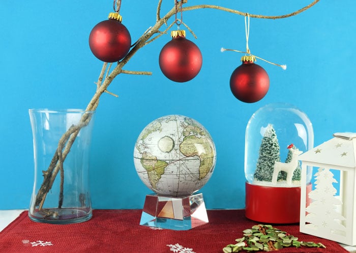 Antique terrestrial MOVA globe with christmas decor