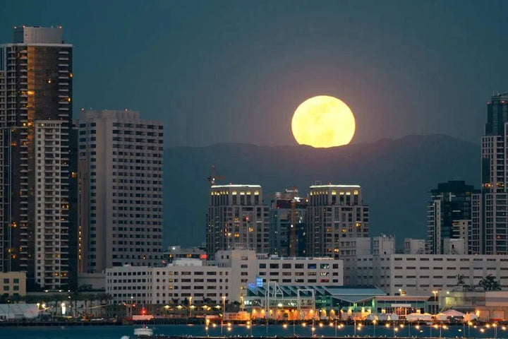 What are Supermoons and how often do they occur?