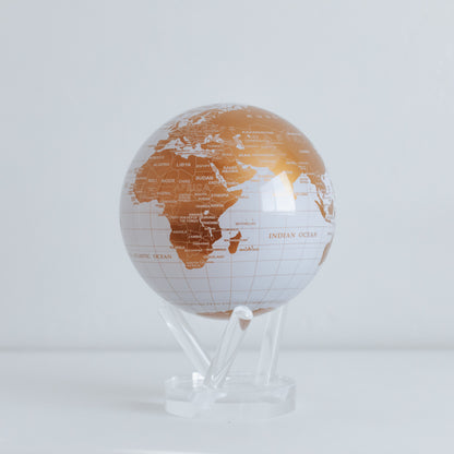 WHITE AND GOLD GLOBE Turns using ambient light - MOVA US