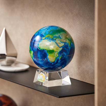Earth Turquoise Gem decorative globe on a shelf