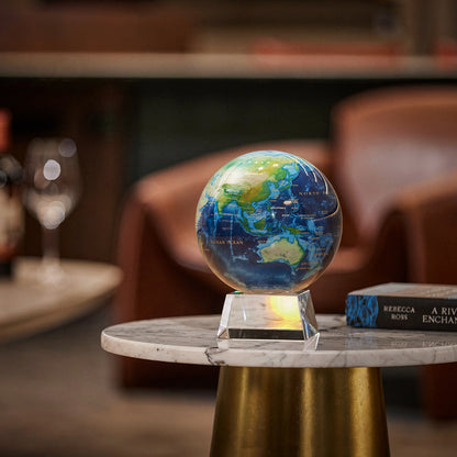 Earth Turquoise Gem globe on a marble side table