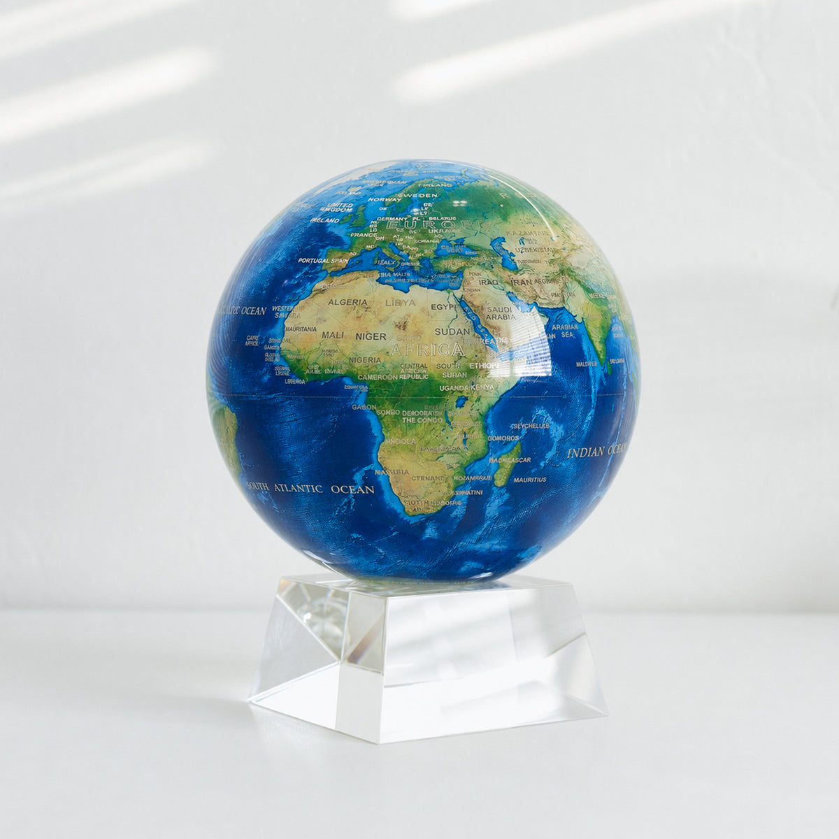 Earth Turquoise Gem MOVA Globe on a  crystal base