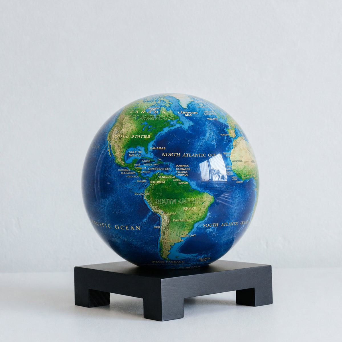 Earth Turquoise Gem MOVA Globe on a black wood square base