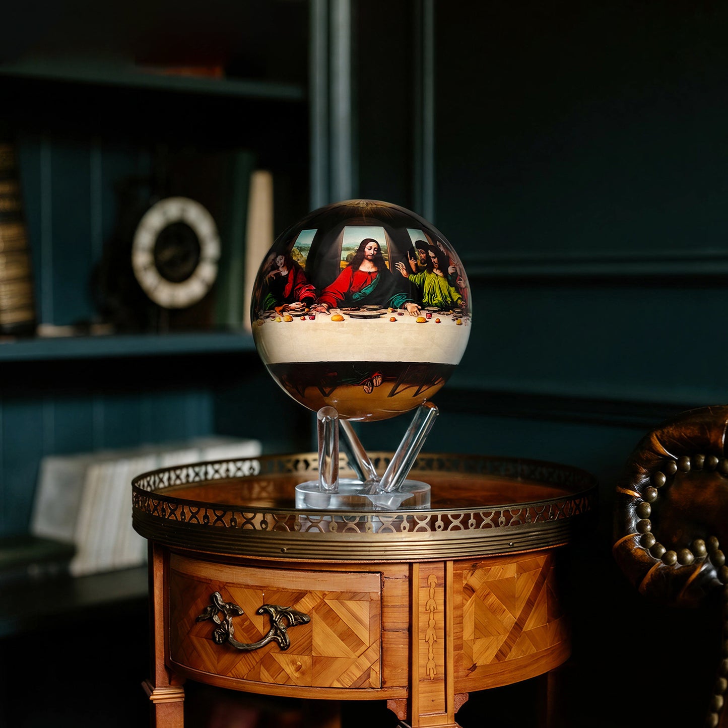 luxury Last Supper MOVA Globe placed on wooden cabinet as sophisticated religious art decor