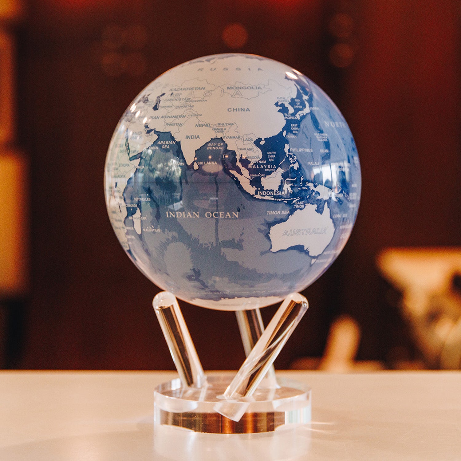 Sky Blue & White Globe - Ambient Light Powered Rotating Globe Sky Blue & White Globe - Ambient Light Powered Rotating Globe
