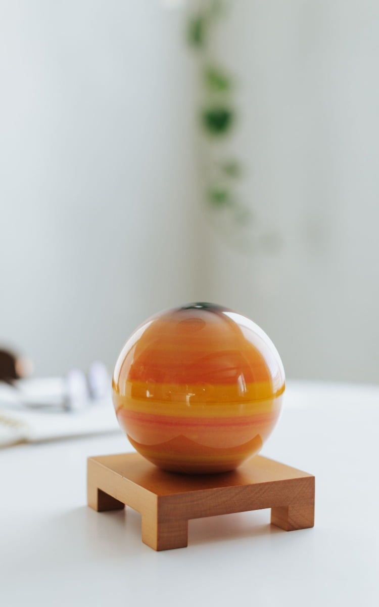 Saturn globe on wooden base